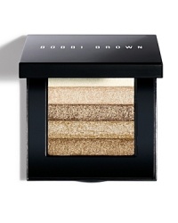 This shimmering, brush-on powder creates a candlelight glow. Works well with pink, neutral and peach blush shades. This shimmering, brush-on powder creates a candlelight glow. Works well with pink, neutral and peach blush shades.