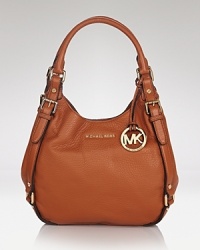 A handbag that you'll have forever, and wear with everything: this classic, MICHAEL Michael Kors shoulder bag is the best of both, styled in rich leather. A handbag that you'll have forever, and wear with everything: this classic, MICHAEL Michael Kors shoulder bag is the best of both, styled in rich leather.