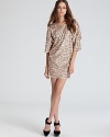 Shimmer in sequins with this dazzling Rachel Zoe dress flaunting fashionable dolman sleeves and a cropped length.