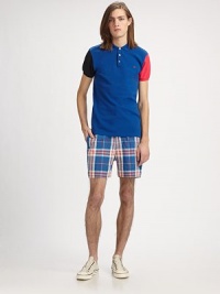 Effortless style and comfort go hand in hand with this classic polo in bold colorblocked cotton.Three-button placketCottonMachine washImported Effortless style and comfort go hand in hand with this classic polo in bold colorblocked cotton.Three-button placketCottonMachine washImported