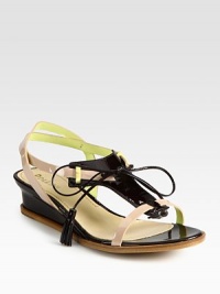 Lengthy tassel laces front playful patent leather straps, concluding with a slight self-covered wedge. Self-covered wedge, 1 (25mm)Patent leather upperLeather lining and solePadded insoleMade in ItalyOUR FIT MODEL RECOMMENDS ordering one half size up as this style runs small. Lengthy tassel laces front playful patent leather straps, concluding with a slight self-covered wedge. Self-covered wedge, 1 (25mm)Patent leather upperLeather lining and solePadded insoleMade in ItalyOUR FIT MODEL RECOMMENDS ordering one half size up as this style runs small.