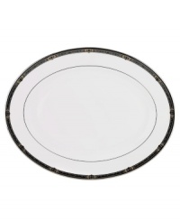 For nearly 150 years, Lenox has been renowned throughout the world as a premier designer and manufacturer of fine china. The Vintage Jewel pattern from Lenox's dinnerware and dishes collection evokes a more gracious era, combining pure white bone china with a dark, richly patterned band of muted gold, taupe, charcoal, and black, and accented with subtle touches of cobalt blue. For nearly 150 years, Lenox has been renowned throughout the world as a premier designer and manufacturer of fine china. The Vintage Jewel pattern from Lenox's dinnerware and dishes collection evokes a more gracious era, combining pure white bone china with a dark, richly patterned band of muted gold, taupe, charcoal, and black, and accented with subtle touches of cobalt blue.