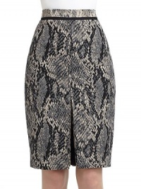 THE LOOKAllover snake printBanded waistVented font and back hemBack zip with hook-and-eye-closureTHE FITAbout 24 from waist to hemTHE MATERIAL60% wool/20% nylon/20% polyesterFully linedCARE & ORIGINDry cleanImportedModel shown is 5'10 (177cm) wearing US size 4. THE LOOKAllover snake printBanded waistVented font and back hemBack zip with hook-and-eye-closureTHE FITAbout 24 from waist to hemTHE MATERIAL60% wool/20% nylon/20% polyesterFully linedCARE & ORIGINDry cleanImportedModel shown is 5'10 (177cm) wearing US size 4.