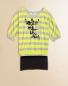 A lightweight top gets a fashion-forward update with bold, contrasting stripes, glittery stars and rock-inspired lettering.ScoopneckDolman sleevesPullover styleBanded hem60% polyester/40% rayonMachine washImported