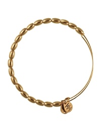 A flash of Russian gold plated beads lends texture rich shine on a delicate, expandable Alex and Ani bracelet. A flash of Russian gold plated beads lends texture rich shine on a delicate, expandable Alex and Ani bracelet.