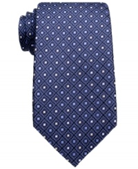 A classic neat pattern gives this Tasso Elba tie perennial appeal in your dress wardrobe. A classic neat pattern gives this Tasso Elba tie perennial appeal in your dress wardrobe.