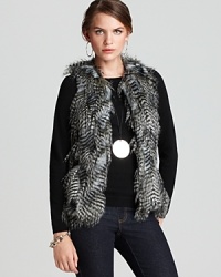 Send your style on an exotic quest in a faux-fur Karen Kane vest touting a textured silhouette for untamed attitude. Send your style on an exotic quest in a faux-fur Karen Kane vest touting a textured silhouette for untamed attitude.
