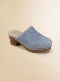The classic comfort of clogs, made even better in rich suede with a cozy sheepskin lining.Tonal striped suede upperStud detailPadded insoleLeather footbedSheepskin liningMolded rubber sole and heelImported The classic comfort of clogs, made even better in rich suede with a cozy sheepskin lining.Tonal striped suede upperStud detailPadded insoleLeather footbedSheepskin liningMolded rubber sole and heelImported