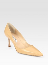Lavish, low-cut leather point toe with a slightly stacked heel. Stacked heel, 2¾ (70mm)Leather upperPoint toeLeather liningBuffed leather solePadded insoleMade in Italy Lavish, low-cut leather point toe with a slightly stacked heel. Stacked heel, 2¾ (70mm)Leather upperPoint toeLeather liningBuffed leather solePadded insoleMade in Italy