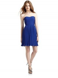 THE LOOKStrapless sweetheart necklineRuched sidesInterior soft bra cupsBoned bodicePleated skirt with ruffle hemSide zipperTHE FITAbout 27 from top to hemTHE MATERIALPolyesterFully linedCARE & ORIGINDry cleanImportedModel shown is 5'11 (180cm) wearing US size Small.This item was originally available for purchase at Saks Fifth Avenue OFF 5TH stores. THE LOOKStrapless sweetheart necklineRuched sidesInterior soft bra cupsBoned bodicePleated skirt with ruffle hemSide zipperTHE FITAbout 27 from top to hemTHE MATERIALPolyesterFully linedCARE & ORIGINDry cleanImportedModel shown is 5'11 (180cm) wearing US size Small.This item was originally available for purchase at Saks Fifth Avenue OFF 5TH stores.