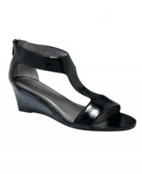 Dressed to a T. Sleek, smooth and totally versatile, Adrienne Vittadini's Coby wedge sandals feature a subtle wedge and sultry t-strap that make for timeless style. Dressed to a T. Sleek, smooth and totally versatile, Adrienne Vittadini's Coby wedge sandals feature a subtle wedge and sultry t-strap that make for timeless style.