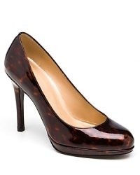 Look red hot in these patent leather platform pumps. Round toe with 4 covered heel and .5 platform. Leather lining and leather sole. Look red hot in these patent leather platform pumps. Round toe with 4 covered heel and .5 platform. Leather lining and leather sole.