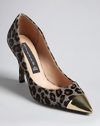 Show the exotics trend who's boss in these fiercely feline pointed toe pumps polished off with commanding cap toes, from STEVEN BY STEVE MADDEN. Show the exotics trend who's boss in these fiercely feline pointed toe pumps polished off with commanding cap toes, from STEVEN BY STEVE MADDEN.