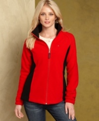 Whether you're wearing it alone or layering it, Tommy Hilfiger's fleece jacket gives you a cozy feel with tailored style. Whether you're wearing it alone or layering it, Tommy Hilfiger's fleece jacket gives you a cozy feel with tailored style.