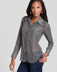 Whether fancied up with a pencil skirt or laid-back with jeans, this GUESS button-down top exudes effortless chic. Whether fancied up with a pencil skirt or laid-back with jeans, this GUESS button-down top exudes effortless chic.