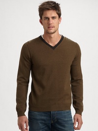 Contrast trim along the neckline defines this essential pullover sweater, shaped in a sumptuous wool blend.V-neckRibbed knit cuffs and hem50% wool/25% camel hair/25% nylonHand washImported Contrast trim along the neckline defines this essential pullover sweater, shaped in a sumptuous wool blend.V-neckRibbed knit cuffs and hem50% wool/25% camel hair/25% nylonHand washImported