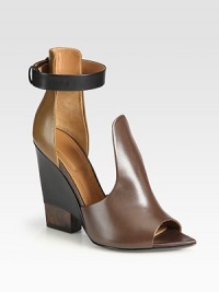 Expertly sculpted design of rich Italian leather in contrasting hues, with a slender ankle strap and marbled heel. Self-covered and lacquered heel, 4½ (115mm)Leather upperAdjustable, hidden buckle ankle strapLeather lining and solePadded insoleMade in Italy Expertly sculpted design of rich Italian leather in contrasting hues, with a slender ankle strap and marbled heel. Self-covered and lacquered heel, 4½ (115mm)Leather upperAdjustable, hidden buckle ankle strapLeather lining and solePadded insoleMade in Italy