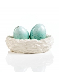 Get nesting. Egg-shaped salt and pepper shakers plucked from the charming Bloom dinnerware pattern add an extra dash of whimsy to the casual dining area. From Edie Rose by Rachel Bilson.
