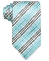 Check yourself. This classic patterned tie from Geoffrey Beene ups the ante on your 9-to-5 style. Check yourself. This classic patterned tie from Geoffrey Beene ups the ante on your 9-to-5 style.
