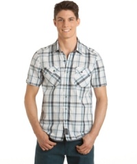 Just kickin' it. Get instant laid-back appeal with this short-sleeved plaid shirt from Calvin Klein Jeans. Just kickin' it. Get instant laid-back appeal with this short-sleeved plaid shirt from Calvin Klein Jeans.
