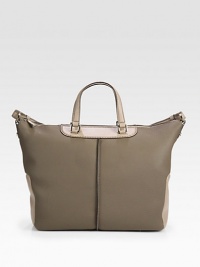 A simply chic style in luxurious pebbled leather with a colorblock design.Double top handles, 4¾ dropAdjustable shoulder strap, 4-7¼ dropTop zip closureProtective metal feetOne inside zip pocketFully lined12½W X 11H X 5DImported A simply chic style in luxurious pebbled leather with a colorblock design.Double top handles, 4¾ dropAdjustable shoulder strap, 4-7¼ dropTop zip closureProtective metal feetOne inside zip pocketFully lined12½W X 11H X 5DImported