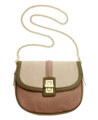 A socialite-worthy style that brings the shine. This Danielle Nicole flap bag features polished gold-tone hardware, sleek contrast trim and an ultra-chic chain shoulder strap. A socialite-worthy style that brings the shine. This Danielle Nicole flap bag features polished gold-tone hardware, sleek contrast trim and an ultra-chic chain shoulder strap.