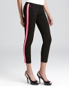 Contrast stripes down the legs add a pop of color to these Hudson skinny jeans.