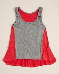 Colorblocks rule the summer trends, and Aqua's sleeveless tunic deftly blends a two rich tones, a knotted shoulder strap and a wide, flowing hem. Colorblocks rule the summer trends, and Aqua's sleeveless tunic deftly blends a two rich tones, a knotted shoulder strap and a wide, flowing hem.