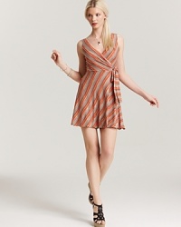 This boldly striped Bailey 44 dress cuts an ultra-flattering silhouette with a chic wrap design. This boldly striped Bailey 44 dress cuts an ultra-flattering silhouette with a chic wrap design.
