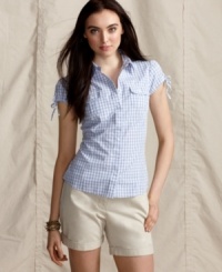 Spring into a fresh look with this cotton button-front shirt from Tommy Hilfiger. Priced low and high in style, it's an essential staple. Spring into a fresh look with this cotton button-front shirt from Tommy Hilfiger. Priced low and high in style, it's an essential staple.