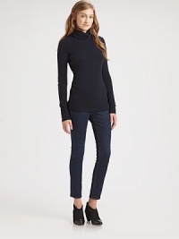 Elevate your look with timeless sophistication in this pure cashmere turtleneck. TurtleneckLong sleevesLonger length hits below the hipsCashmereDry cleanImportedModel shown is 5'11 (178cm) wearing US size XSmall. Elevate your look with timeless sophistication in this pure cashmere turtleneck. TurtleneckLong sleevesLonger length hits below the hipsCashmereDry cleanImportedModel shown is 5'11 (178cm) wearing US size XSmall.