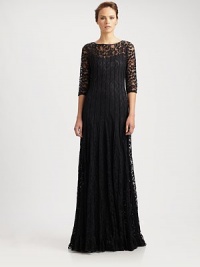 Delicate allover pintucks shape this feminine, floor-length lace design.Jewel necklineThree-quarter sleevesConcealed back zipSlip liningAbout 46 from natural waistNylonDry cleanImportedModel shown is 5'10 (177cm) wearing US size 4. Delicate allover pintucks shape this feminine, floor-length lace design.Jewel necklineThree-quarter sleevesConcealed back zipSlip liningAbout 46 from natural waistNylonDry cleanImportedModel shown is 5'10 (177cm) wearing US size 4.