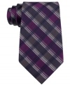 Pave your way to polished style with this grid-patterned silk tie from Calvin Klein.