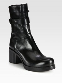 A stacked platform and heel heighten this seasonal favorite in butter-soft Italian leather. Stacked heel, 2½ (65mm)Stacked platform, ¾ (20mm)Compares to a 1¾ heel (45mm)Shaft, 7¾Leg circumference, 10Leather upperSide zip and strap with metal pull-tab closureLeather lining and solePadded insoleMade in Italy A stacked platform and heel heighten this seasonal favorite in butter-soft Italian leather. Stacked heel, 2½ (65mm)Stacked platform, ¾ (20mm)Compares to a 1¾ heel (45mm)Shaft, 7¾Leg circumference, 10Leather upperSide zip and strap with metal pull-tab closureLeather lining and solePadded insoleMade in Italy