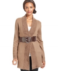 Cozy up to this tunic-length cardigan, outfitted with a matching belt and a soft, textured shawl collar. Cozy up to this tunic-length cardigan, outfitted with a matching belt and a soft, textured shawl collar.