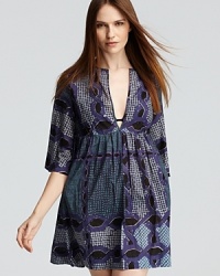 Burberry Brit offers chic poolside style with this tunic-style coverup, crafted in a relaxed, oversized silhouette for effortless look. Burberry Brit offers chic poolside style with this tunic-style coverup, crafted in a relaxed, oversized silhouette for effortless look.