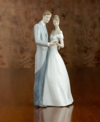 A beautiful wedding gift the happy couple will always treasure. Bride and groom dancing in glazed porcelain. Stands 8.25 tall. A beautiful wedding gift the happy couple will always treasure. Bride and groom dancing in glazed porcelain. Stands 8.25 tall.