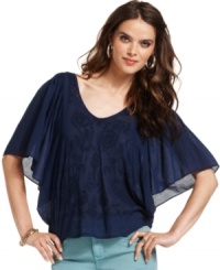 Beat the heat in this vintage-inspired cotton top from DKNY Jeans. The flutter sleeves and embroidery at the chest are bohemian-chic touches that add instant coolness to to you wardrobe. Beat the heat in this vintage-inspired cotton top from DKNY Jeans. The flutter sleeves and embroidery at the chest are bohemian-chic touches that add instant coolness to to you wardrobe.
