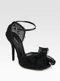 Satin and semi-sheer lace upper accompanied by a delicate bow and an adjustable slingback strap. Self-covered heel, 4½ (115mm)Lace and satin upperLeather lining and solePadded insoleMade in ItalyOUR FIT MODEL RECOMMENDS ordering one size up as this style runs small. Satin and semi-sheer lace upper accompanied by a delicate bow and an adjustable slingback strap. Self-covered heel, 4½ (115mm)Lace and satin upperLeather lining and solePadded insoleMade in ItalyOUR FIT MODEL RECOMMENDS ordering one size up as this style runs small.