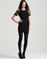 A fresh vision of the season's glamorous party frock, this body-con Kimberly Taylor dress boasts sequin sleeves and the surprise of leather trim for a hint of downtown edge. A fresh vision of the season's glamorous party frock, this body-con Kimberly Taylor dress boasts sequin sleeves and the surprise of leather trim for a hint of downtown edge.