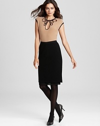 A one-piece approach to polished perfect, this Tory Burch dress flaunts a contrast bodice with a stunning embellished neckline for a luxe style statement. A one-piece approach to polished perfect, this Tory Burch dress flaunts a contrast bodice with a stunning embellished neckline for a luxe style statement.