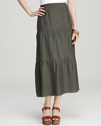 Tiered layers of silk cascade the length of this Eileen Fisher maxi skirt. Balance the fluid piece with a crisp white tank for everyday elegance. Tiered layers of silk cascade the length of this Eileen Fisher maxi skirt. Balance the fluid piece with a crisp white tank for everyday elegance.