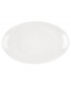 A modern balance. Create a sense of effortless urban luxury with the Matte & Shine platter, featuring a minimalist coupe shape, white glaze and tonal banding by Donna Karan Lenox.