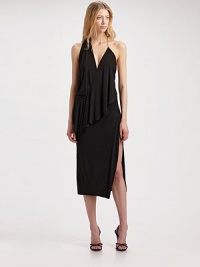 Sumptuous jersey drapes elegantly around the body in this stunning asymmetric design, finished with a plunging open-back.Crossover V neckline Sleeveless Ruffled overlay drapes asymmetrically from front to back Tapered skirt with side slit V back with single strap About 34 from natural waist Viscose Dry clean Imported
