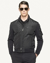 A powerful combination of rugged military inspiration and modern craftsmanship, the Loft bomber jacket channels a contemporary vibe in soft, mercerized fleece with sleek microfiber facing. A powerful combination of rugged military inspiration and modern craftsmanship, the Loft bomber jacket channels a contemporary vibe in soft, mercerized fleece with sleek microfiber facing.