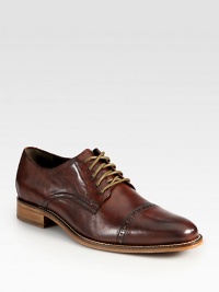 A sleek, heritage-inspired design constructed in remarkably rich leather.Leather upperLeather liningPadded insoleLeather/rubber soleImported A sleek, heritage-inspired design constructed in remarkably rich leather.Leather upperLeather liningPadded insoleLeather/rubber soleImported