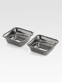 Stainless steel, polished to a high shine and accented with signature Molten edging.From the Molten CollectionStainless steelSet of 23.75W X 3.75L X 1.25HHand washImported Stainless steel, polished to a high shine and accented with signature Molten edging.From the Molten CollectionStainless steelSet of 23.75W X 3.75L X 1.25HHand washImported