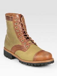 Not to be limited to the hiking trails, this lace-up style is expertly crafted for maximum durability and performance in genuine leather and canvas.Canvas/leather upperLeather liningRubber soleImported Not to be limited to the hiking trails, this lace-up style is expertly crafted for maximum durability and performance in genuine leather and canvas.Canvas/leather upperLeather liningRubber soleImported