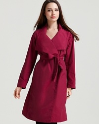 Embrace rainy days with a cheery-hued Eileen Fisher trench coat, flaunting a cascading collar and a flattering tie waist for feminine appeal. Embrace rainy days with a cheery-hued Eileen Fisher trench coat, flaunting a cascading collar and a flattering tie waist for feminine appeal.