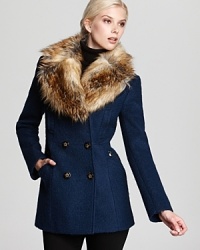 A bold faux fur collar brings cozy winter style to this double-breasted wool coat from Laundry by Shelli Segal. A bold faux fur collar brings cozy winter style to this double-breasted wool coat from Laundry by Shelli Segal.